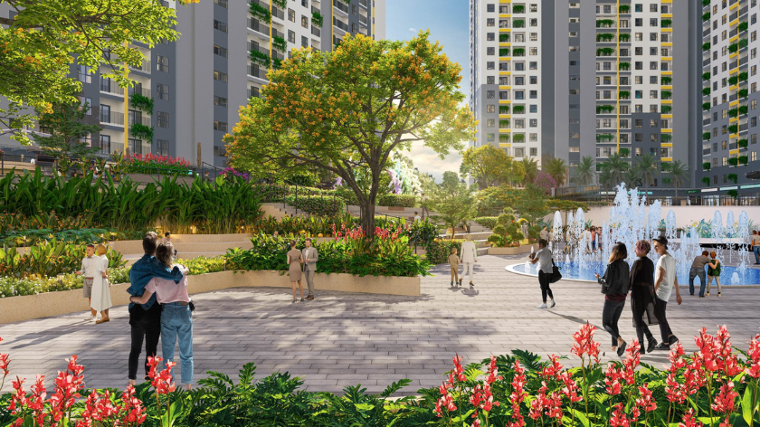 Hình ảnh phối cảnh cảnh quan Bcons Central Park Biên Hòa, thể hiện không gian đi bộ rộng rãi, cây xanh, vườn hoa và đài phun nước giữa các tòa căn hộ. Thiết kế hướng đến môi trường sống thoáng đãng, tạo không gian thư giãn và kết nối cộng đồng cư dân. Hình ảnh phù hợp sử dụng trong bài viết giới thiệu dự án, phân tích cảnh quan, tiện ích và môi trường sống tại Bcons Central Park Biên Hòa.