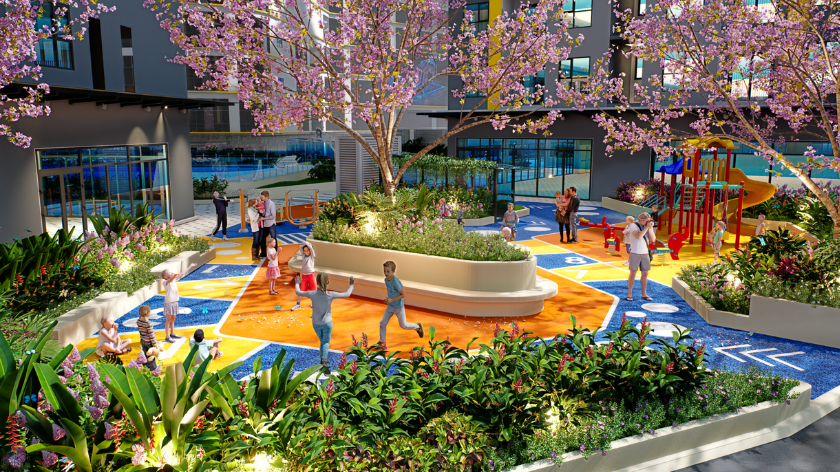 Hình ảnh phối cảnh khu vui chơi trẻ em tại Bcons Central Park, nổi bật với sân chơi nhiều màu sắc, cầu trượt, thiết bị vui chơi ngoài trời và các bồn cây xanh. Không gian được bố trí kết hợp cùng khu vực nghỉ ngơi, tạo môi trường sinh hoạt và vui chơi cho trẻ nhỏ trong khu căn hộ.