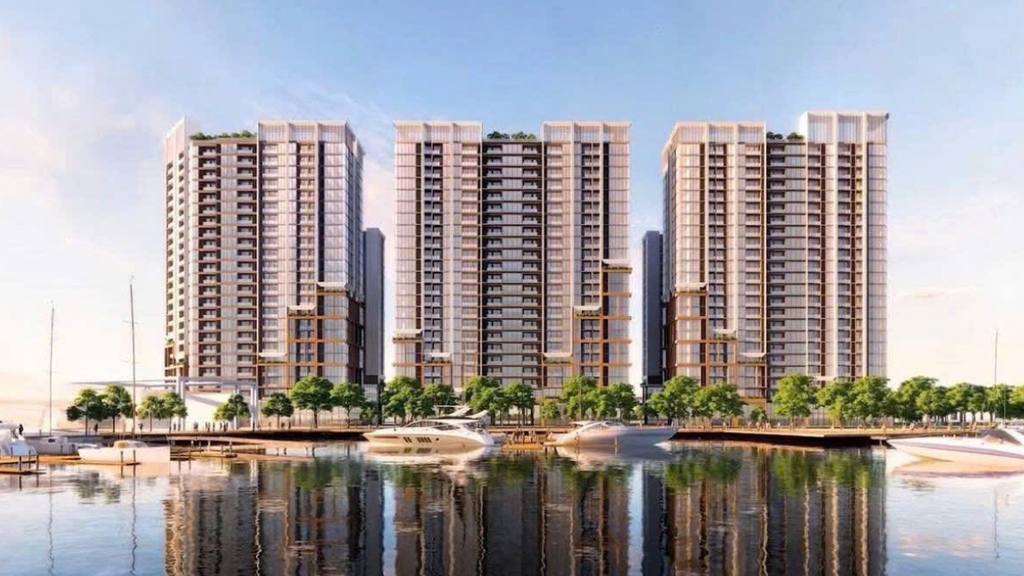Hình ảnh phối cảnh kiến trúc các tòa căn hộ cao tầng tại Charmora City với thiết kế hiện đại, ban công rộng, không gian cây xanh và cảnh quan mặt nước phía trước. Hình ảnh minh họa định hướng phát triển không gian sống kết hợp kiến trúc đô thị và cảnh quan sông nước tại Nam Nha Trang.